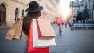 A file picture of a woman with shopping bags. Pic: iStock