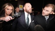 Mixed martial arts fighter Conor McGregor (centre) and partner Dee Devlin leave the High Court in Dublin after the personal injury case against him. Nikita Hand, who is also known as Nikita Ni Laimhin, alleges she was raped by McGregor in a Dublin hotel in December 2018. After deliberating for six hours and 10 minutes, the jury returned with their verdicts in the civil trial against Conor McGregor. The total amount of damages awarded to Nikita Hand by the jury was 248,603.60 euro. Picture date: Friday November 22, 2024. PA Photo. See PA story IRISH McGregor. Photo credit should read: Brian Lawless/PA Wire 