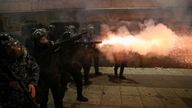 Police fire at protesters in Tbilisi on Friday night. Pic: Reuters