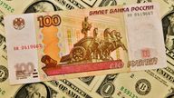 Russian ruble, rouble, US dollar, United States dollar, RUB, USD, banknote, paper money, cash. Photo/Petr Svancara (CTK via AP Images)


