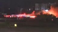The burning plane at Antalya airport in southern Turkey on Sunday. 
Pic: Hava Sosyal Medya