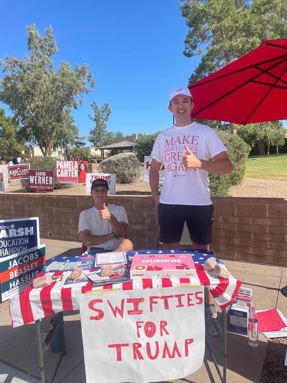 26-year-old mortgage broker Dane Jenson (right) made a joke "Swifties for Trump" sign in Arizona