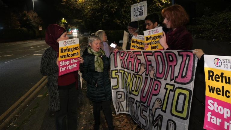 A pro-refugee campaign group outside the church