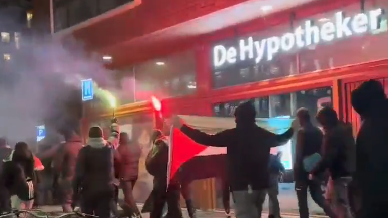 Pro-Palestinian protesters march in the suburbs of Amsterdam on Thursday evening