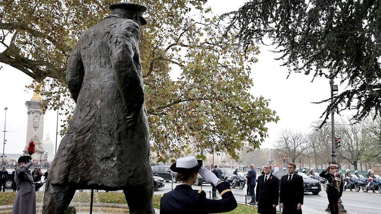 Emmanuel Macron and Keir Starmer attend a wreath-laying ceremony in front of the statue of Winston Churchill.
Pic: Reuters