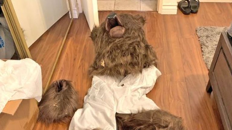Detectives discovered the bear suit after searching one of the suspects' home. Pic: California Department of Insurance