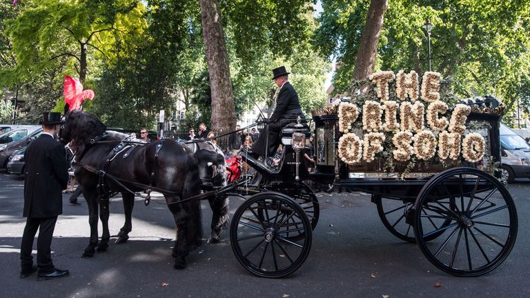 Mandatory Credit: Photo by James Gourley/Shutterstock 
A horse drawn hearse with a floral tribute reading 'The Prince of Soho'
Bernie Katz funeral procession, Soho, London, UK - 22 Sep 2017