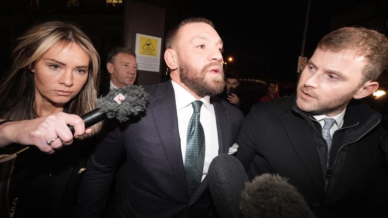 Mixed martial arts fighter Conor McGregor (centre) and partner Dee Devlin leave the High Court in Dublin after the personal injury case against him. Nikita Hand, who is also known as Nikita Ni Laimhin, alleges she was raped by McGregor in a Dublin hotel in December 2018. After deliberating for six hours and 10 minutes, the jury returned with their verdicts in the civil trial against Conor McGregor. The total amount of damages awarded to Nikita Hand by the jury was 248,603.60 euro. Picture date: Friday November 22, 2024. PA Photo. See PA story IRISH McGregor. Photo credit should read: Brian Lawless/PA Wire 