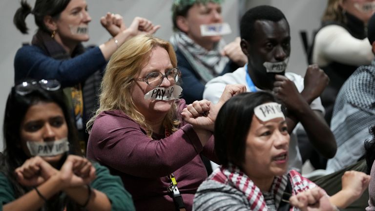 Activists demonstrate for climate finance at COP29. Pic: AP