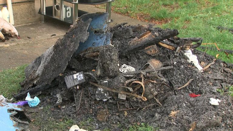 Debris outside the flat where the fire was