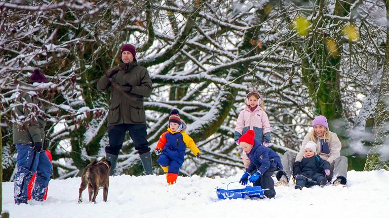 People play in the snow on the hills of Buxton, Derbyshire. . The UK is bracing for snow, ice and cold temperatures as up to 20cm of snow could hit the UK over the coming days. Picture date: Tuesday November 19, 2024.