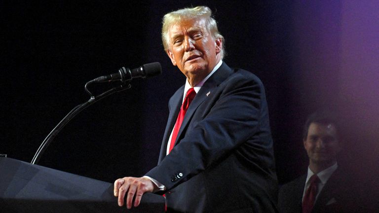 Republican presidential nominee and former U.S. President Donald Trump takes the stage following early results from the 2024 U.S. presidential election in Palm Beach County Convention Center, in West Palm Beach, Florida, U.S., November 6, 2024. REUTERS/Callaghan O'Hare