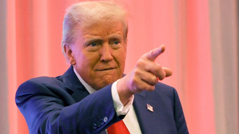 U.S. President-elect Donald Trump gestures as he meets with House Republicans on Capitol Hill in Washington, U.S., November 13, 2024. REUTERS/Brian Snyder