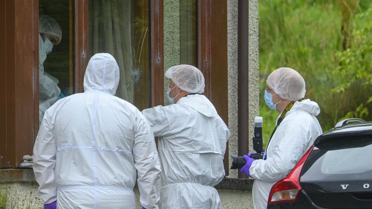 Forensic officers at the scene of an incident at a property in the Dornie area of ​​Wester Ross, on the north-west coast of Scotland. A 47-year-old man has been killed and three people injured in a series of incidents on the Isle of Skye and in nearby Wester Ross, mainland Scotland, where a gun was fired. Date of photo: Thursday, August 11, 2022.