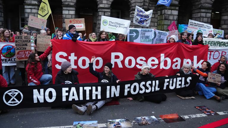 Climate activists from Greenpeace and Uplift during a demonstration outside the Scottish Court of Session, Edinburgh, on the first day of the Rosebank and Jackdaw judicial review hearing. Picture date: Tuesday November 12, 2024.