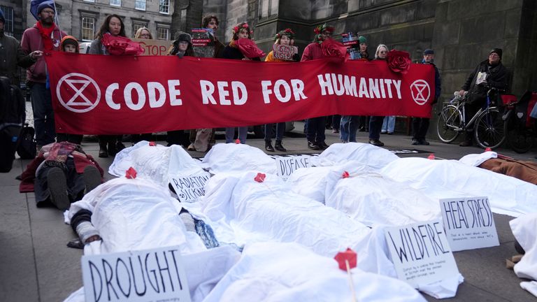 Climate activists from Greenpeace and Uplift during a demonstration outside the Scottish Court of Session, Edinburgh, on the first day of the Rosebank and Jackdaw judicial review hearing. Picture date: Tuesday November 12, 2024.