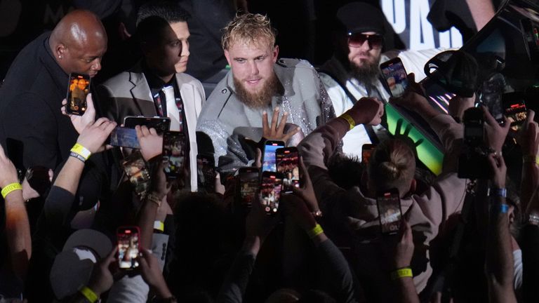 Jake Paul is driven to the ring before a heavyweight boxing match against Mike Tyson, Friday, Nov. 15, 2024, in Arlington, Texas. (AP Photo/Julio Cortez)