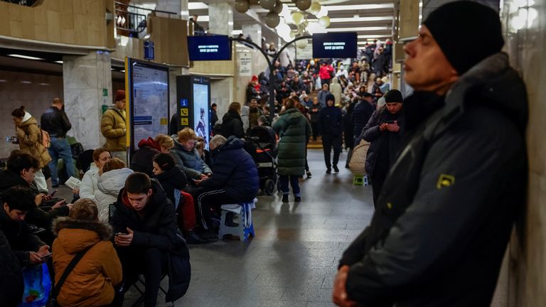 People sheltering in a metro station in Kyiv. Pic: Reuters