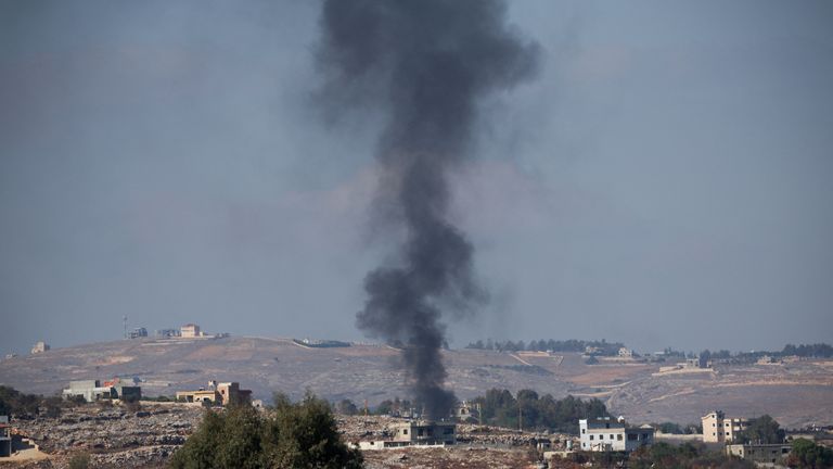 Smoke rises above the skyline in southern Lebanon near the border with Lebanon. Pic: Reuters