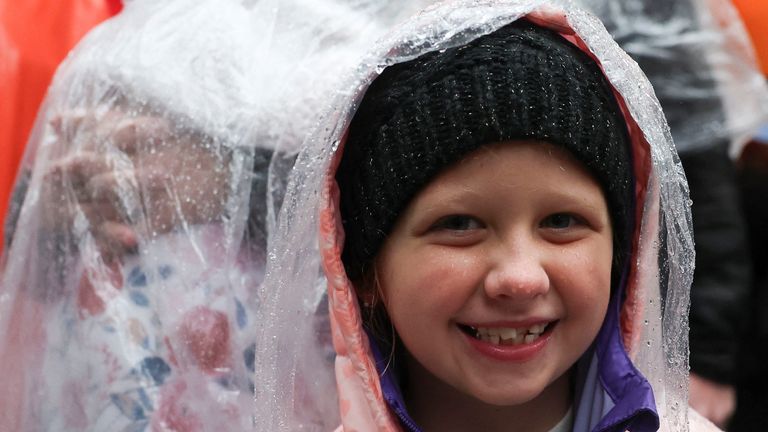 A child attends the 98th Macy's Thanksgiving Day Parade in New York City, U.S., November 28, 2024. REUTERS/Brendan McDermid

