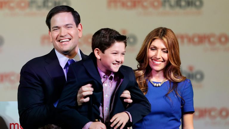 Florida Sen. Marco Rubio holds up his son Anthony after announcing his bid for the Republican presidential nomination, during a rally at the Freedom Tower, Monday, April 13, 2015, in Miami. Rubio was accompanied by his family, including his wife Jeanette and son Dominic. (AP Photo/Wilfredo Lee)


