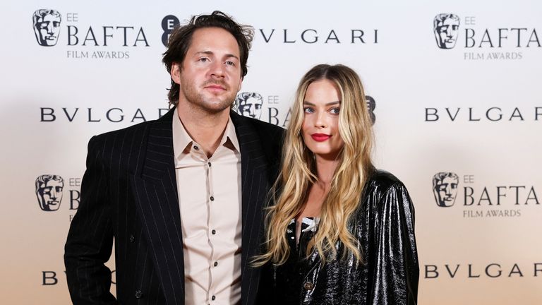 Margot Robbie and her husband Tom Ackerley. Pic: Reuters