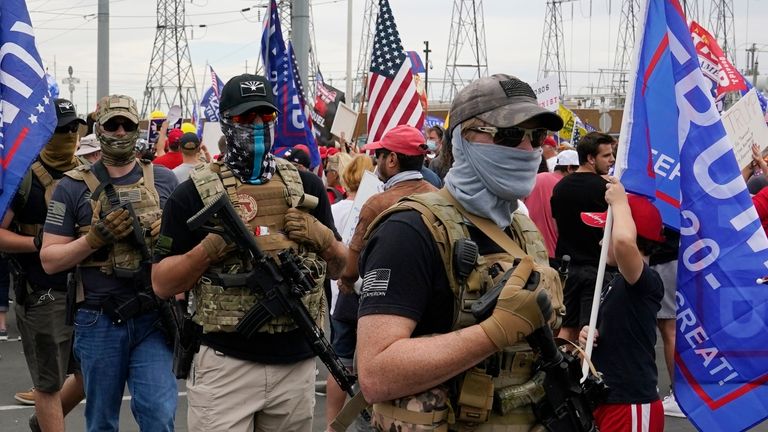 Three days after the last election, Trump supporters gathered at the Maricopa Recorder's Office. photo: AP