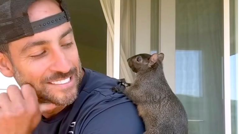 Mark Longo with his pet squirrel Peanut.
Pic: AP