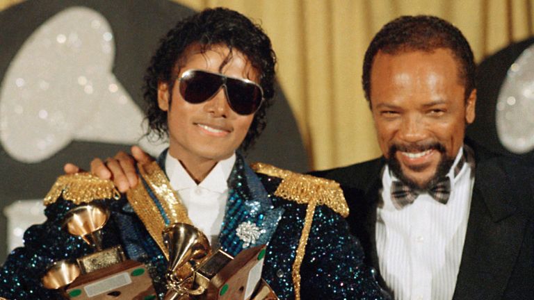 Michael Jackson with Quincy Jones shown at the Grammy Awards at Shrine Auditorium, Feb. 28, 1984 in Los Angeles. Jackson won total of Eight Grammys. (AP Photo/Doug Pizac/Saxon)