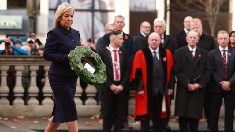 First Minister Michelle ONeill lays a wreath at Belfast City Hall. Pic: PA