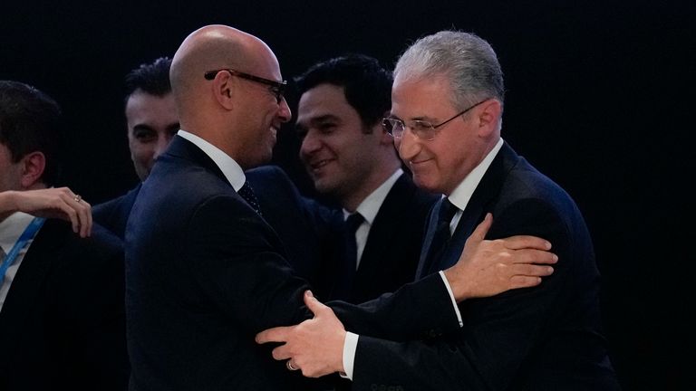 The summit&#39;s president, Mukhtar Babayev (right), embracing the UN&#39;s climate chief. Pic: AP