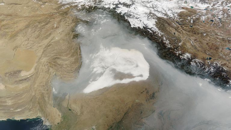 In a satellite image from 12 November, smog can be seen over the Punjab region and the north of India.
Pic: NASA Worldview