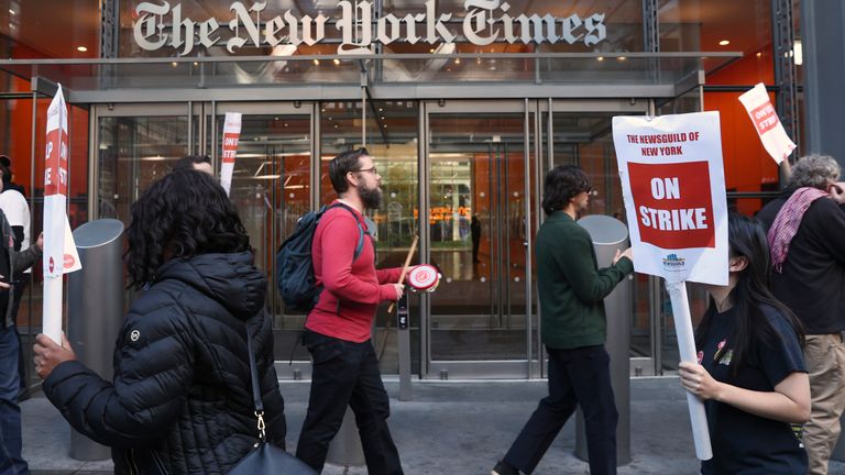 New York Times Tech Workers on the picket line as they strike outside of their employer's building, Friday, Nov. 8, 2024, in New York. (AP Photo/Heather Khalifa)