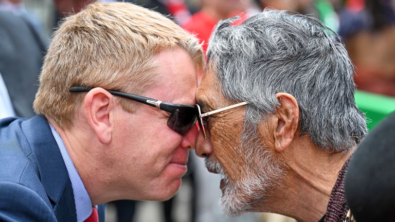 New Zealand's opposition leader Chris Hipkins (left) does a hongi with Hare Arapere as people gathered outside New Zealand's parliament.
Pic: AP