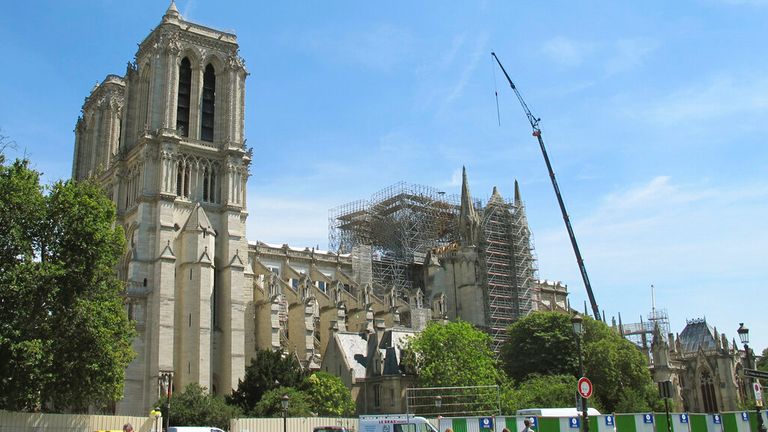 10 July 2019, France, Paris: The partially scaffolded cathedral of Notre-Dame. Three months ago a devastating fire had partially destroyed the cathedral on 15.04.2019. Photo by: Julia Naue/picture-alliance/dpa/AP Images


