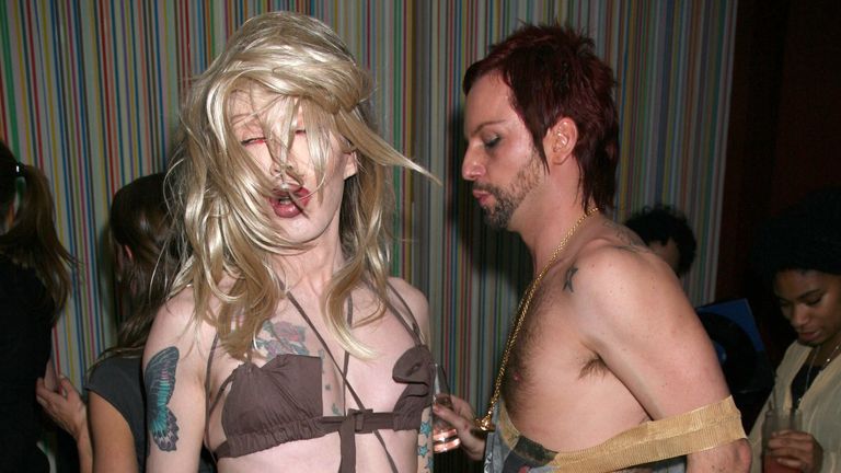 Mandatory Credit: Photo by Richard Young/Shutterstock

Pete Burns and boyfriend Michael Simpson.DAZED AND CONFUSED 'GAP RED' LAUNCH AT THE GROUCHO CLUB, LONDON, BRITAIN - 15 MAR 2006