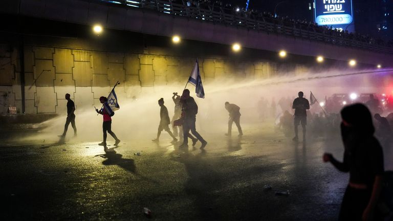 Police usage  h2o  cannon to wide   a radical  of radical   during a protestation  aft  Prime Minister Benjamin Netanyahu has dismissed his defence  curate  Yoav Gallant successful  a astonishment  announcement successful  Tel Aviv, Israel, aboriginal  Wednesday, Nov. 6, 2024. (AP Photo/Francisco Seco)