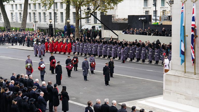 Members of the Royal Family stand before the Cenotaph. Pic: PA