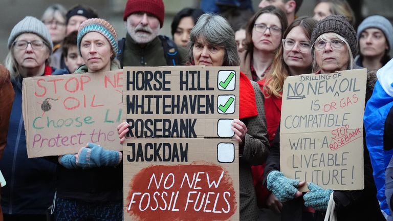 Climate activists from Greenpeace and Uplift during a demonstration outside the Scottish Court of Session, Edinburgh, on the first day of the Rosebank and Jackdaw judicial review hearing. Picture date: Tuesday November 12, 2024.