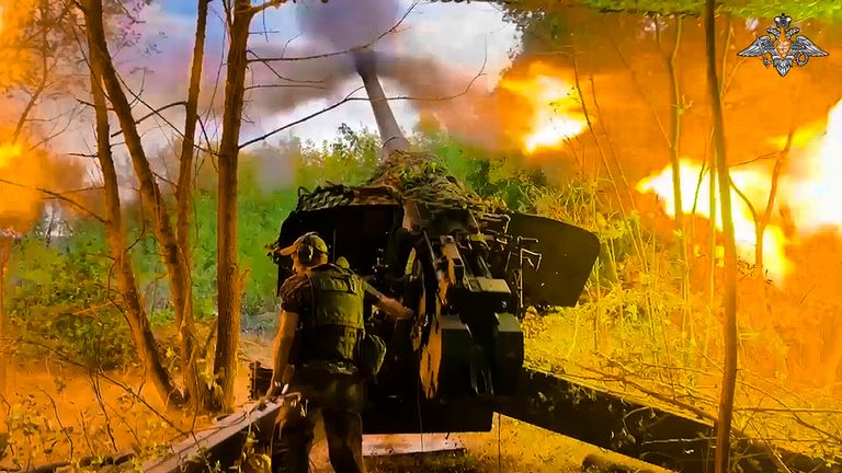 A Russian soldier fires a Msta-B howitzer toward a Ukrainian position in Kursk. Pic: AP