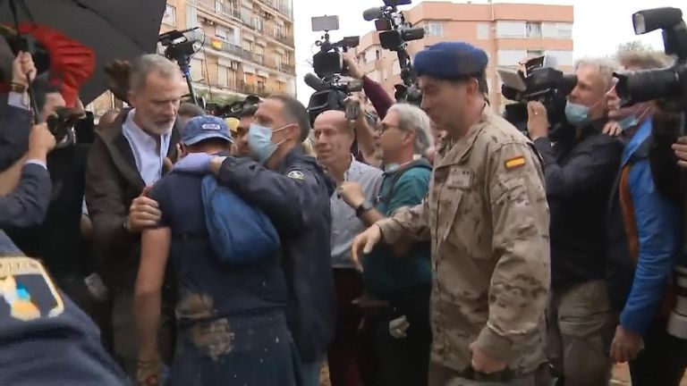 Protesters throw mud and shout insults at King of Spain during visit to ...