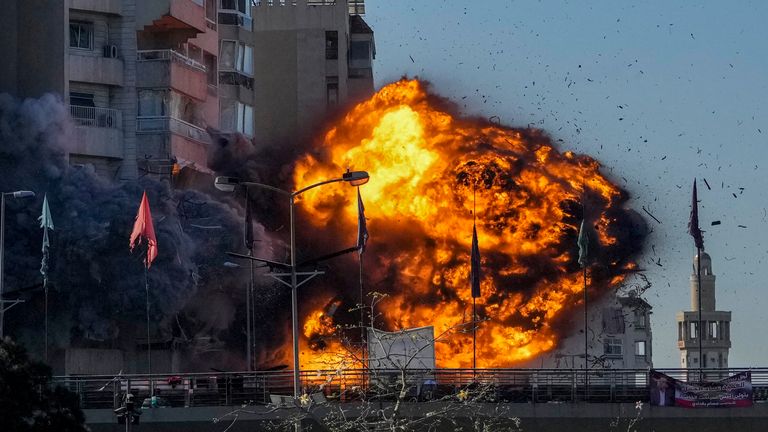 Thick smoke and flames erupt from an Israeli airstrike on Tayouneh, Beirut, Lebanon, Friday, Nov. 15, 2024. (AP Photo/Hassan Ammar)