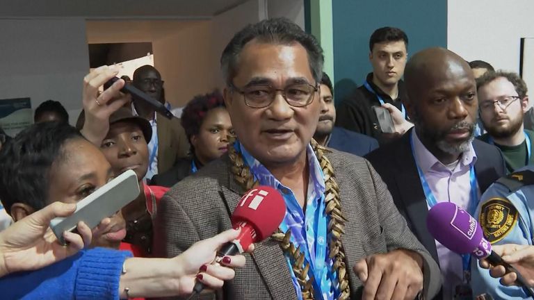 Samoa's minister of natural resources and environment speaks to reporters after walking out of COP negotiations