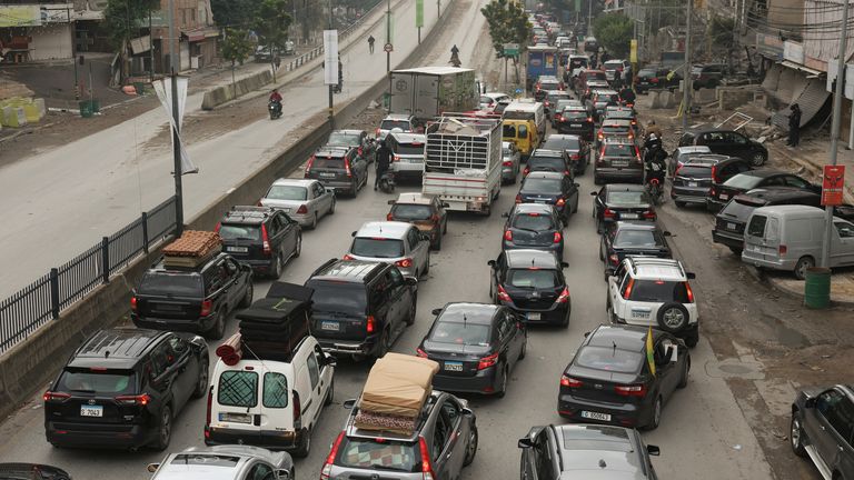 Cars drive in traffic in Beirut's southern suburbs, after a ceasefire between Israel and Iran-backed group Hezbollah took effect. Pic: Reuters