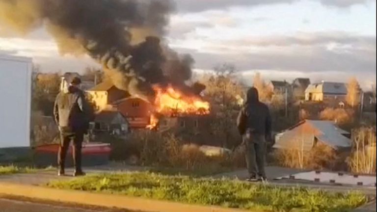 A building on fire near Moscow after a drone attack. Pic: Reuters 
