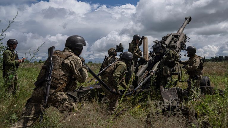 Ukrainian servicemen prepare to fire at Russian positions from a US-supplied M777 howitzer in Kharkiv region, Ukraine. File pic: AP