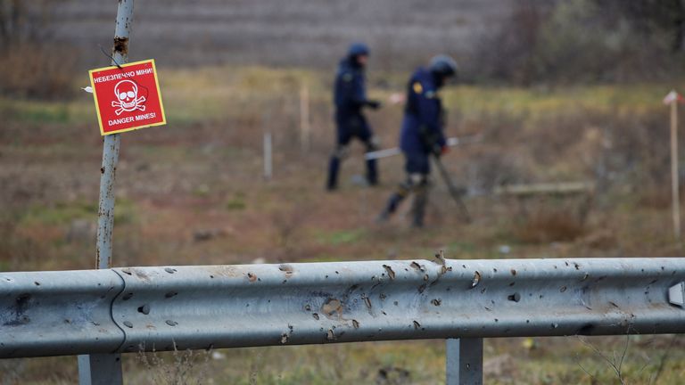 Ukrainian mine experts scan for unexploded ordnance and landmines by the main road to Kherson, Ukraine November 16, 2022. REUTERS/Murad Sezer
