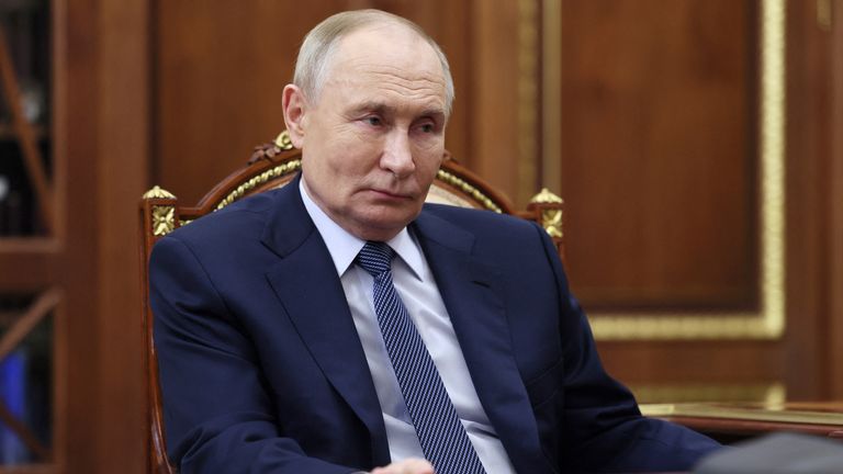 Vladimir Putin listens during a meeting in Moscow. Pic: Reuters