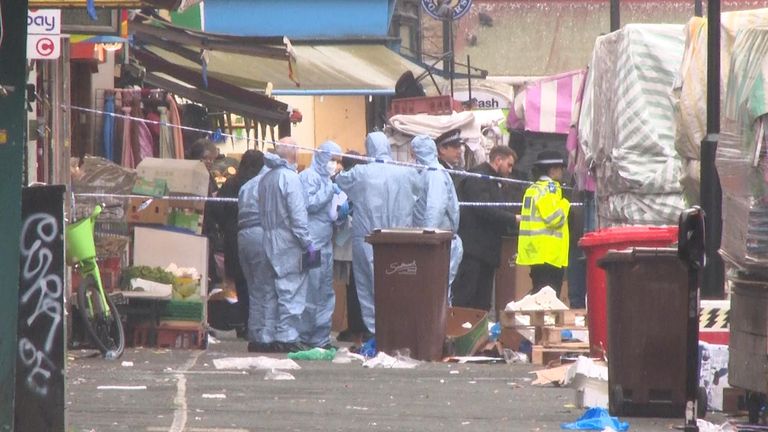 Investigators at the market