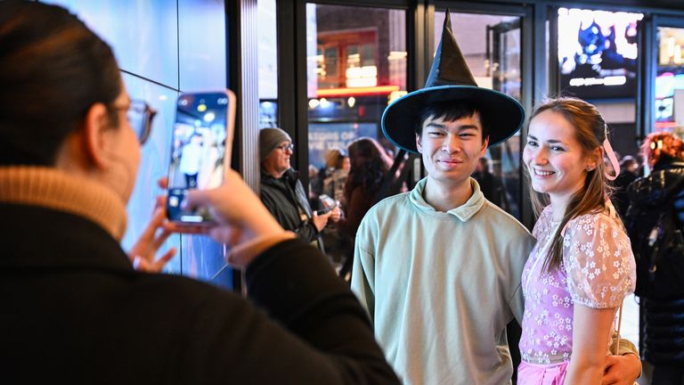 Cinemagoers in London's Leicester Square Vue on the opening night of Wicked. 
Pic: PA